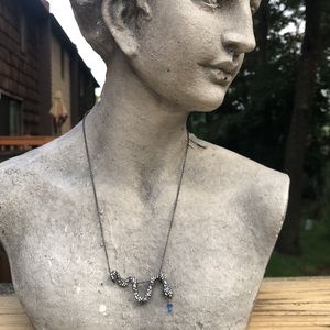 Alexis Bittar snake necklace with blue drop